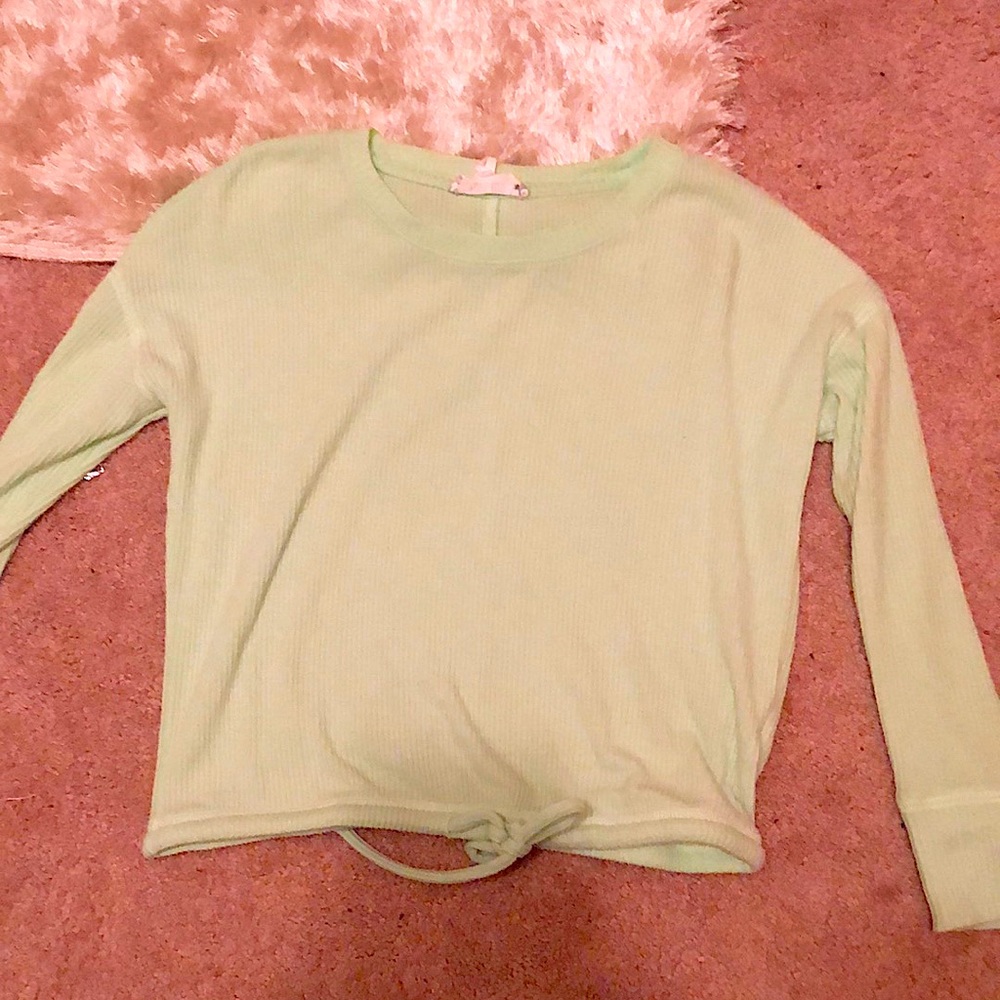 Green soft long sleeved shirt.